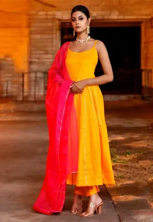 Bright yellow cotton silk Anarkali suit set with refined gota work detailing and a flowing silhouette, designed for festive elegance and graceful comfort, Golden Muslin by Priyanka Rathore.