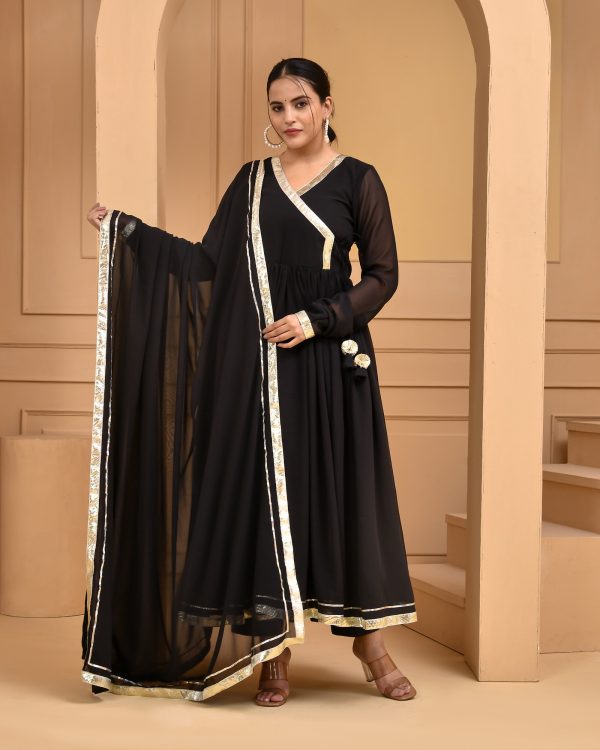 Black georgette floor-length angrakha Anarkali set with subtle gota detailing, solid black pant and matching dupatta finished with gota accents in Golden Muslin by Priyanka Rathore