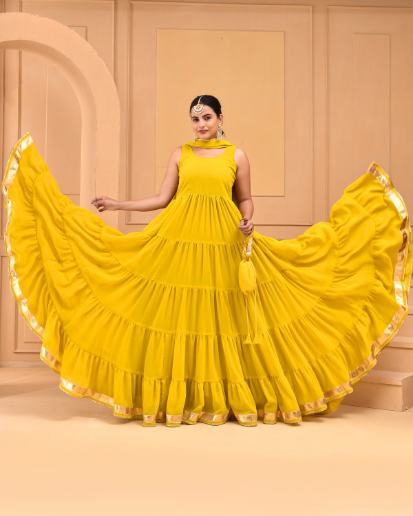 Yellow georgette tiered anarkali set with gota detailing, dupatta and potli from Golden Muslin by Priyanka Rathore
