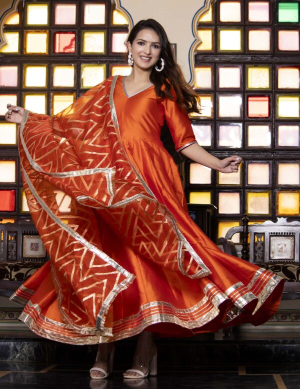 Orange cotton silk Anarkali suit set in Golden Muslin by Priyanka Rathore with gota hem and zari woven dupatta
