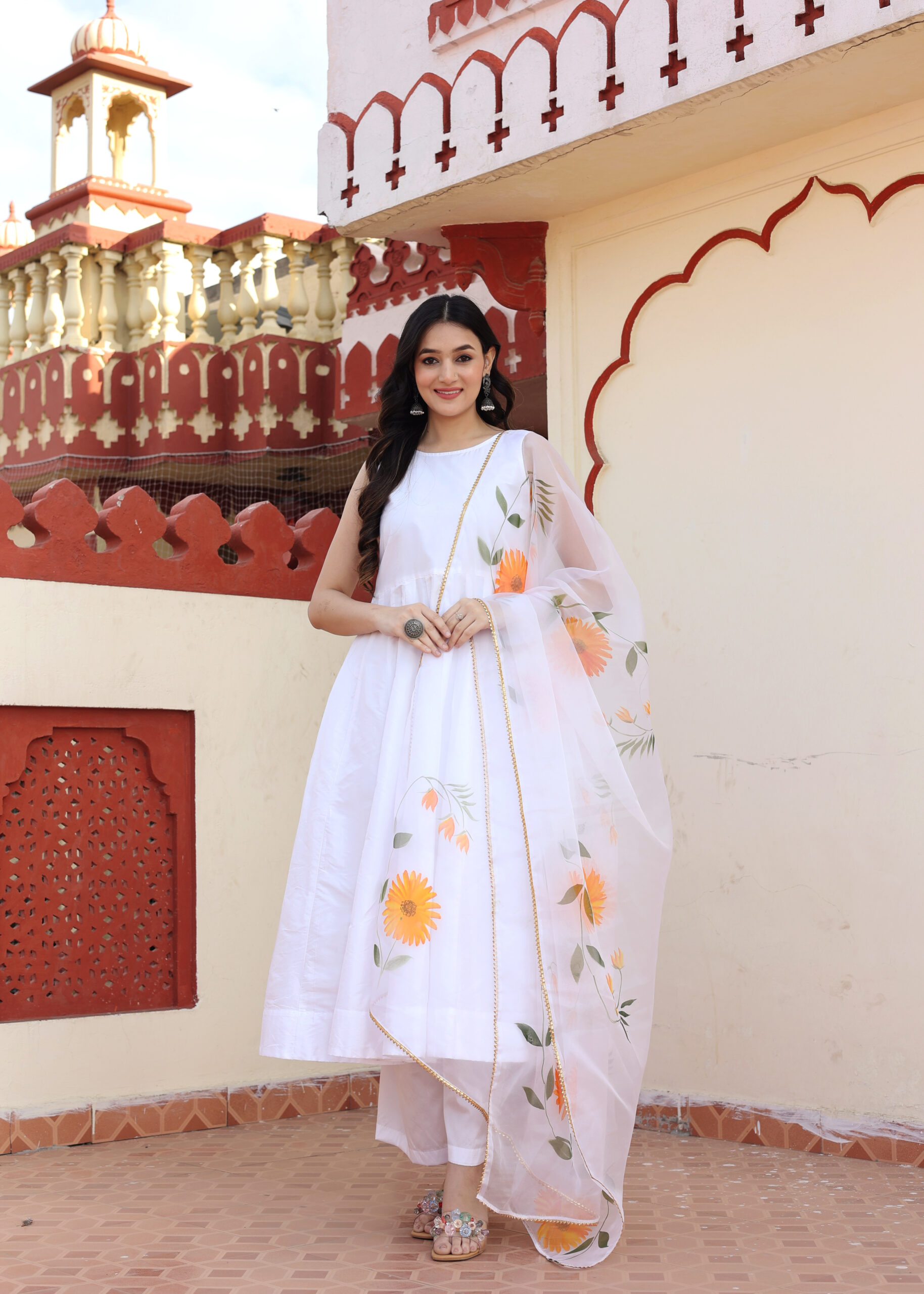 White taffeta silk anarkali in Golden Muslin by Priyanka Rathore with hand-painted organza dupatta