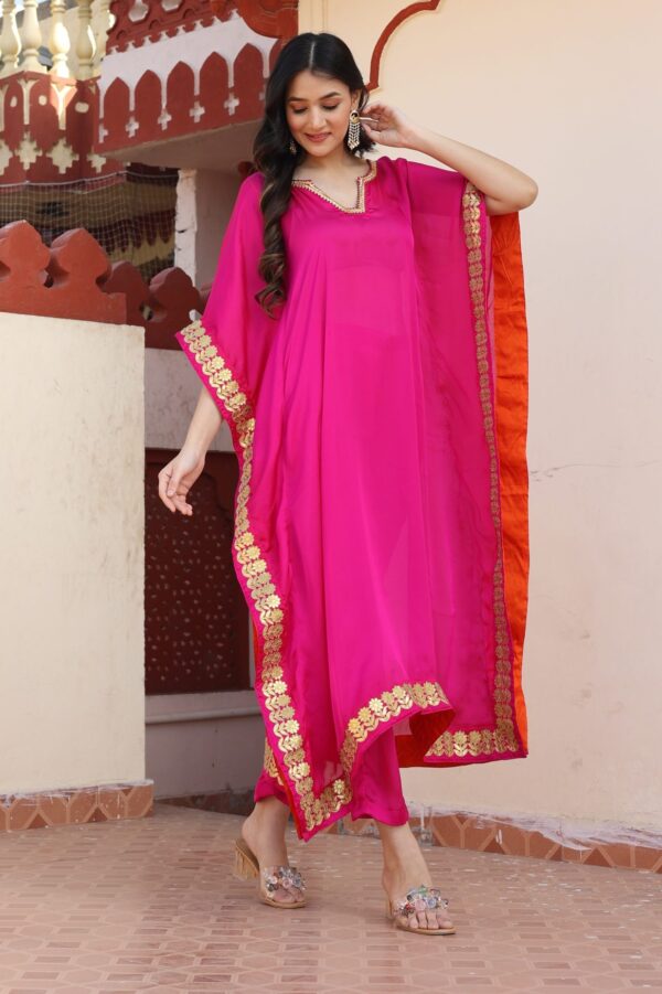 Vibrant pink kaftan set in Golden Muslin by Priyanka Rathore with gota work and matching pant