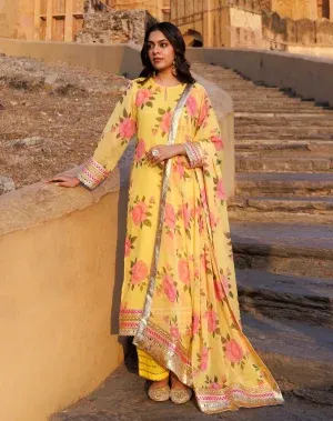 Yellow chiffon kurta set with floral prints, gota detailing, sequin accents and mirror work from Golden Muslin by Priyanka Rathore