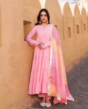 Soft pink cotton tiered Anarkali set with flowy silhouette and graceful movement from Golden Muslin by Priyanka Rathore