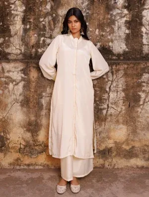 Ivory crepe co-ord set with oversized collared shirt and fluid drape from Golden Muslin by Priyanka Rathore