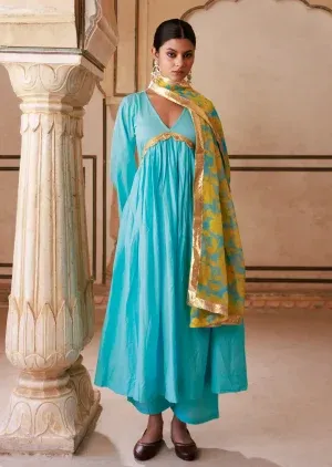 Turquoise cotton Anarkali set with V-neck, soft flare and subtle gota lace detailing from Golden Muslin by Priyanka Rathore