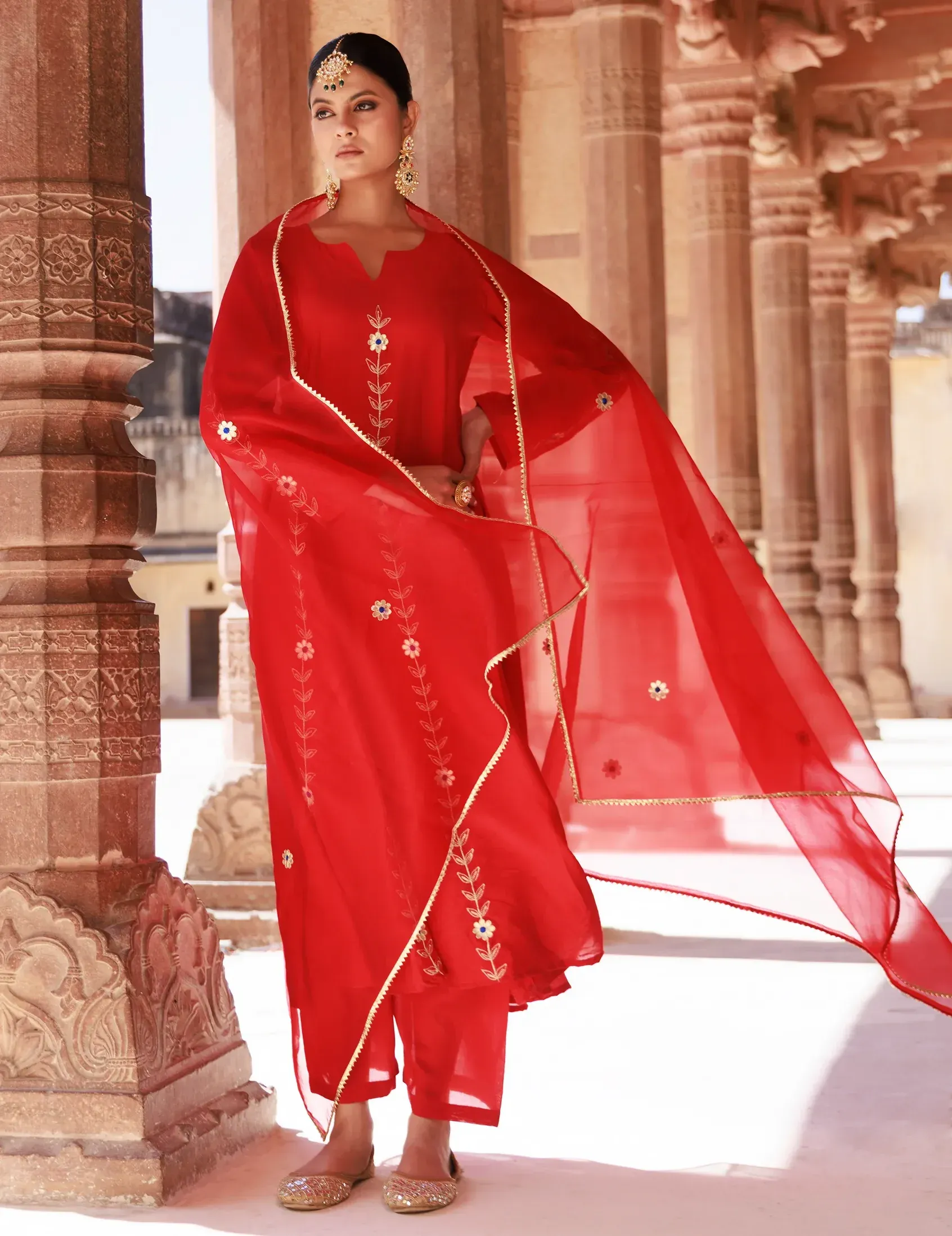 Red Chanderi kurta set with delicate aari embroidery and fluid silhouette from Golden Muslin by Priyanka Rathore